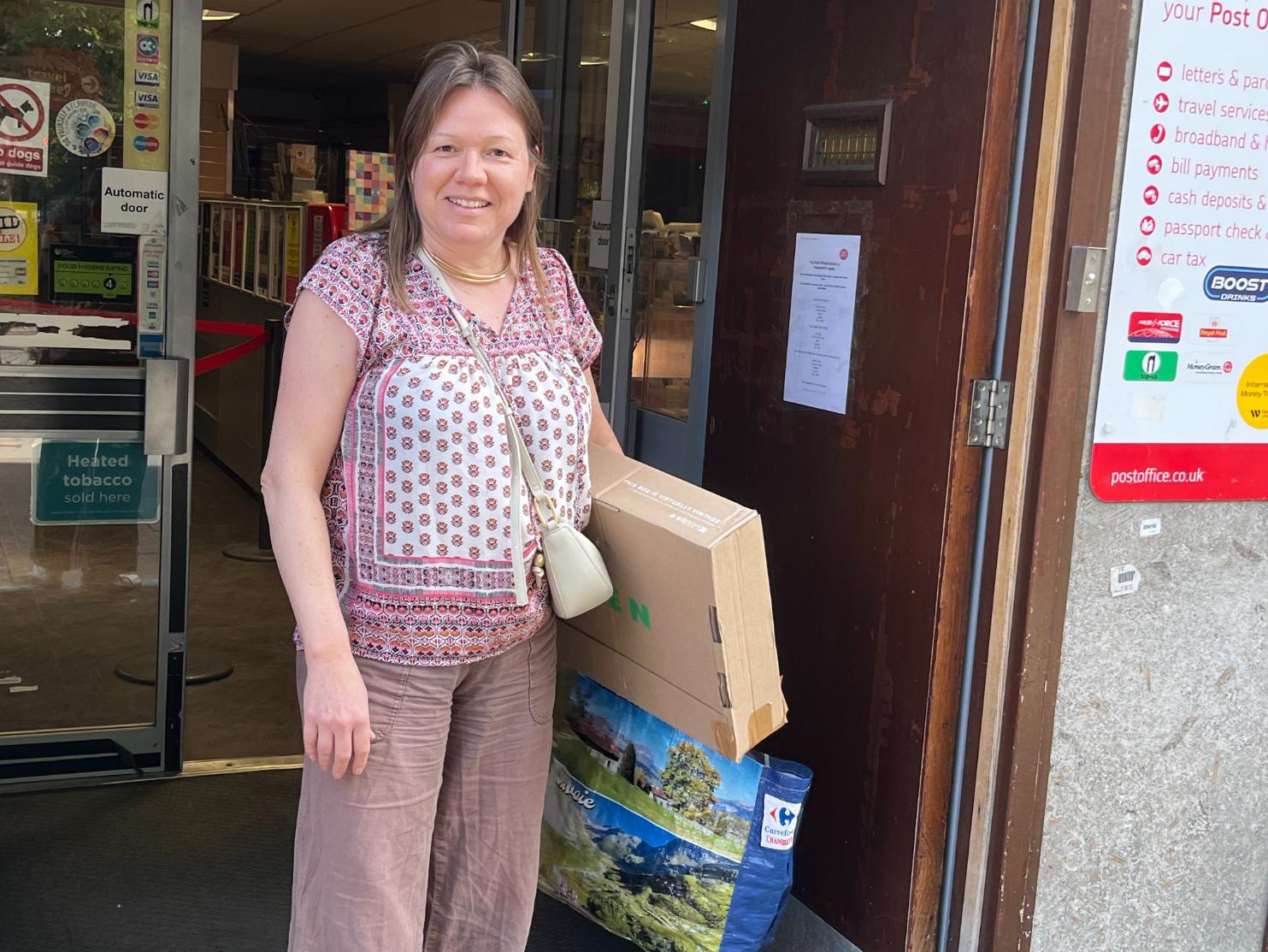 Post Office - woman with parcel_web