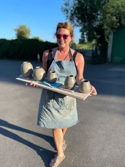 Roz with freshly thrown pots