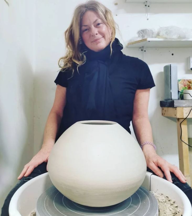 Roz with moon jar in the making
